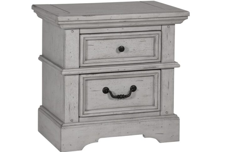 The warm and welcoming Stonebrook Youth Bedroom collection is scaled perfectly for smaller spaces.  The Antique Gray finish is lightly distressed giving character to this well crafted collection.  The Stonebrook Nightstand features 2 drawers for storage along with detailed molding and hammered metal knobs and drawer pulls.  To prevent snagging