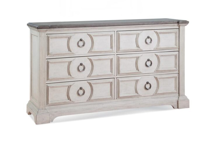 Experience southern charm with a modern twist in the Brighten Bedroom Collection.  The heavily distressed antique white finish is complemented by the antique charcoal tops and modern pewter ring drawer pulls.  Architectural pilasters frame the pieces and enhance the transitional circular designs and raised moldings of the drawer fronts.  The Brighten Dresser features 6 spacious drawers for storage with felt lining in the top drawers to protect your finer things.  Your purchase includes one dresser.