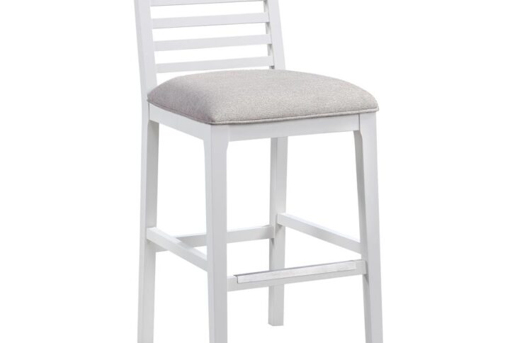 The Siri Bar Stool offers a low profile design with clean lines and a neutral palette to enhance most any décor.  The solid wood frame features a white finish with a comfortable upholstered seat in an easy to clean grey polyester fabric.