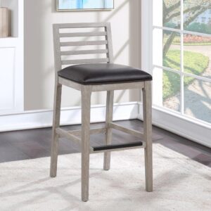 The Siri Bar Stool offers a low profile design with clean lines and a neutral palette to enhance most any décor.  The solid wood frame features a soft driftwood finish with a comfortable upholstered seat in an easy to clean dark brown bonded leather.
