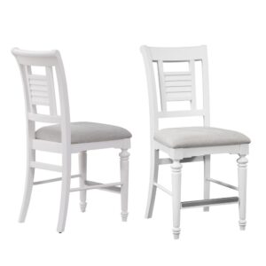 Bring instant charm and warmth to your dining space with the Cottage Traditions’ Counter Height Dining Chairs.  Finished in eggshell white