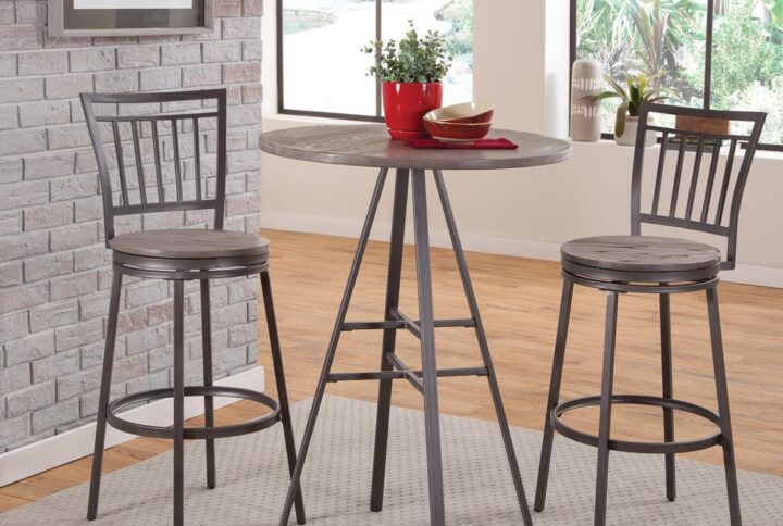 The 3 piece Talia Bar Height Pub Table Set has a clean design and will fit with most any modern decor