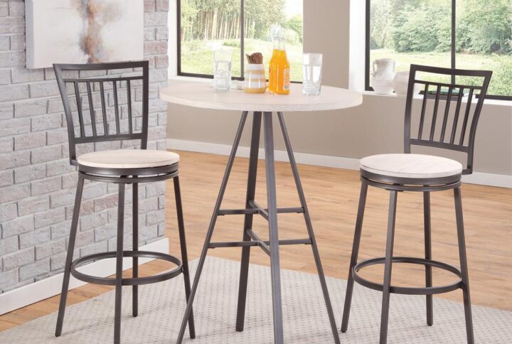 The 3 piece Jacey Bar Height Pub Table Set has a clean design and will fit with most any modern decor