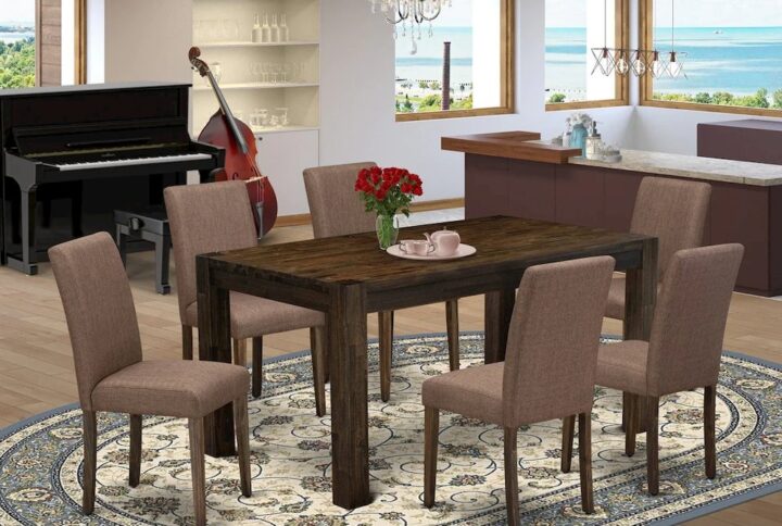Introducing East West furniture's innovative Celina home furniture set that can transform your house into a home. This special and cutting edge kitchen set consists of a kitchen table combined with Parson Chairs. Impressive wood texture with Distressed Jacobean color and the rectangular shape design defines the resilience and durability of the dining table. The optimal dimensions of this kitchen table set made it quite simple to carry