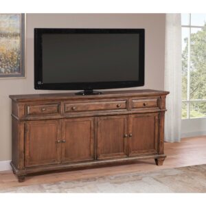 The Sedona Entertainment Console Collection is trending for a look that is rustic yet refined.  The distressed antique cinnamon cherry finish with rub through and detailed molding creates a sense of vintage charm in an up to date style.  Sturdily crafted of hard wood solids with Mango veneers and featuring drawers with English dovetail joinery and full extension ball bearing metal side guides for ease of operation.  Cabinets reveal adjustable shelf with cord management ports.