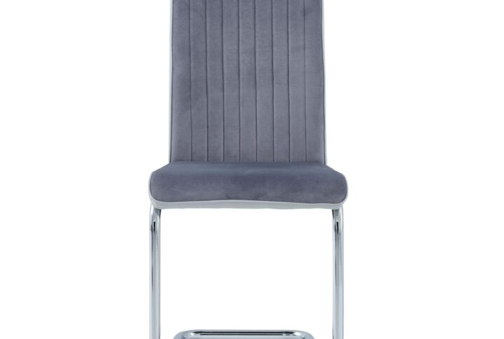 This dining chair will always be a stylish spot to sit back and be comfortable in your entertaining space. Constructed with a chrome metal frame for support with a contrasting light grey faux leather trim