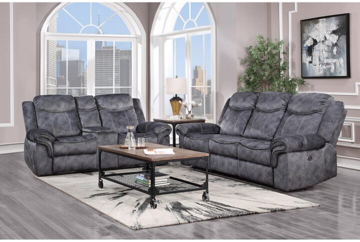 The transitional style of this beautiful motion group offers contrast baseball stitching and leather like welts along the arm and seat. The saddle bag arm adds comfort and style. The console loveseat offers a lift up storage table and two metal cup holders. Along with style and comfort
