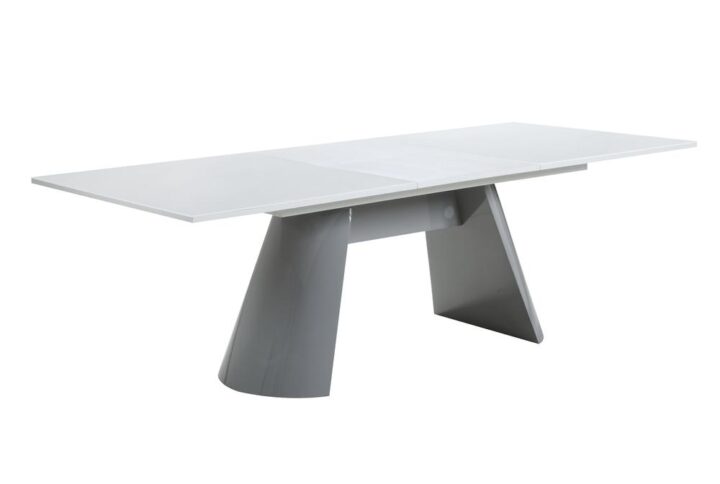 This sleek and modern expandable dining table allows you to seat your friends and family in style and comfort. With the easy accessible butterfly mechanism to accommodate to more diners when the table extended.  Table extends from 71" to 95" long.