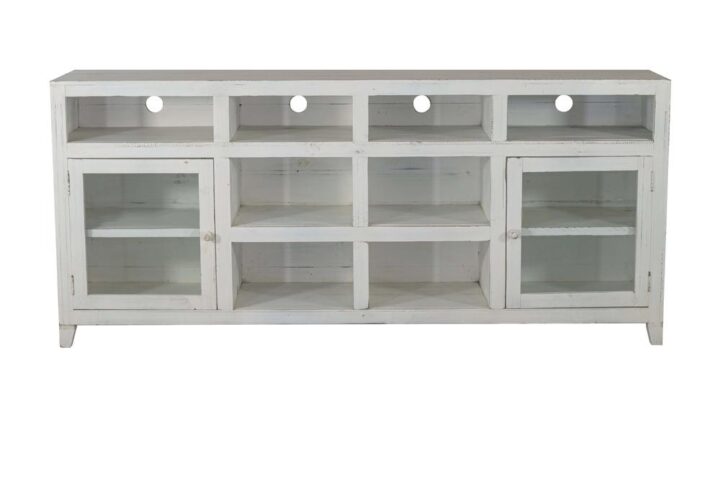 Features two glass wooden framed doors with adjustable shelving behind and the balance is all stationary shelvingCut outs in back for easy access to plug media componentsFinish is hand applied with distressing and rub through for a vintage look