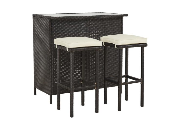 3 piece set including bar and two stoolsStools include a fabric cushionCushions are year round use & machine washable