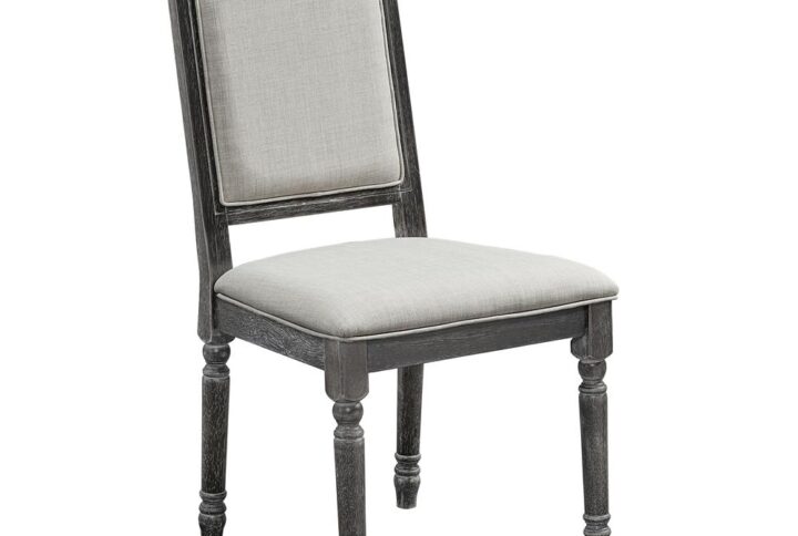 Set of two chairsLinen colored upholsteryWeathered Pepper distressed frame finish