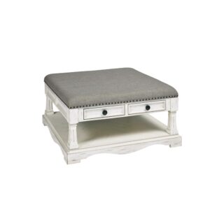 Light gray upholstered cushion topNail head trimTwo drawers for added storage