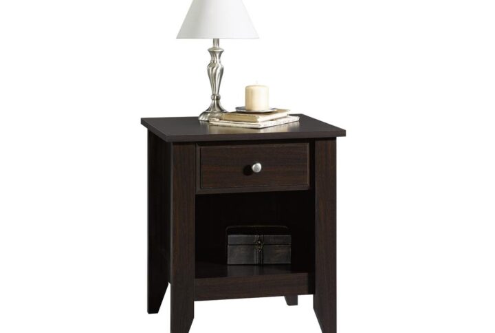 Add some style to your bedroom with this night stand from the Shoal Creek® collection. Find room for all your bedside necessities in the easy-to-access drawer that opens and closes on smooth metal runners. Your reading glasses