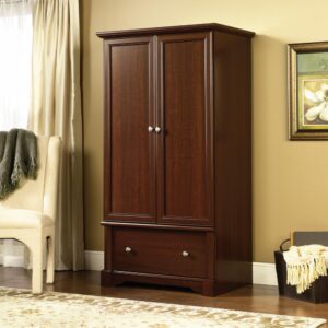 this wardrobe armoire features a hidden storage area that provides you with room for all your outfit essentials. This clothes armoire includes a garment rod so you can conveniently hang and organize apparel like blouses