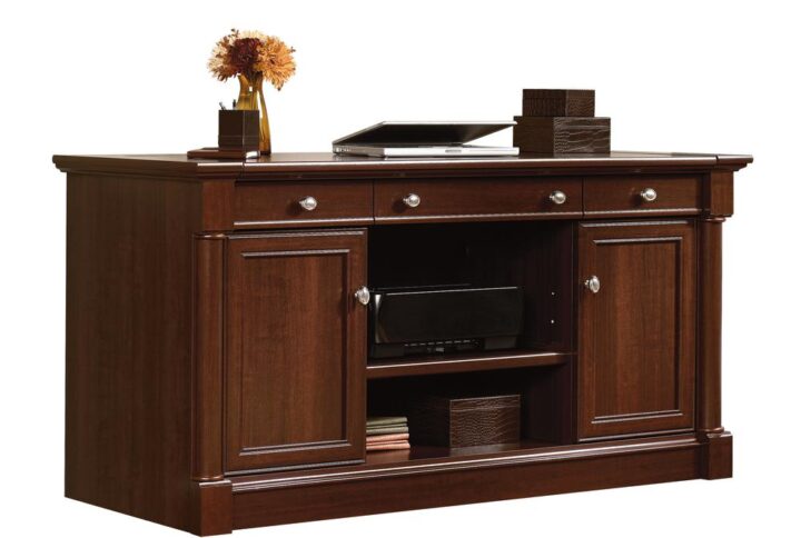 Add a touch of elegant style and timeless beauty to your home with this credenza from the Palladia® collection. It spacious top surface provides you with ample amount of room to display all your favorite home décor items – an accent lamp