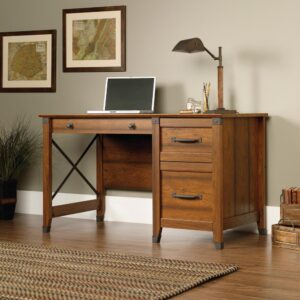 this desk from the Carson Forge® collection is perfect for you. This home office desk features three drawers that glide on smooth metal runners – each provides versatile storage for pens