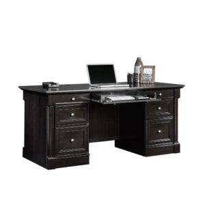 Beautify your home office or workspace with the charming style and simplistic design of this executive desk from the Palladia® collection. This executive office desk features a spacious desk top surface that provides ample room for all your must-have desk essentials ranging from your laptop and cup of coffee to your collection of notepads and an accent lamp. This home office desk features a large drawer/shelf with a flip-down panel for your keyboard/mouse or laptop. Four smaller drawers that open and close on smooth metal runners allow for easy access storage of miscellaneous office supplies like pens