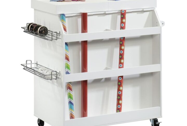 Multi-functional craft solution. Divided storage beneath slide-out top. Divided storage beneath slide-out top.