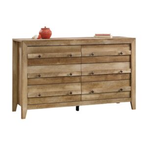 Achieve a rustic aesthetic in your bedroom with this 6-drawer dresser from the Dakota Pass® collection. It features six drawers that open and close on smooth metal runners with safety stops