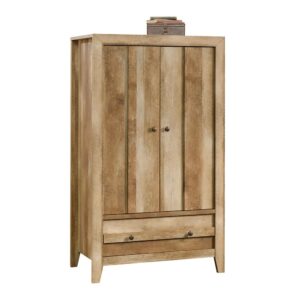 Take a pass on the ordinary. Make a bold statement with this armoire from the Dakota Pass® collection. This impressive 2 door armoire cabinet features a large lower drawer with metal runners and safety stops for items like denim