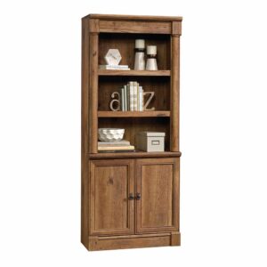 Add timeless beauty and elegant style to your home décor with this library with doors from the Palladia® collection. It features two spacious adjustable shelves that are perfect for storing and displaying anything from your collection of books