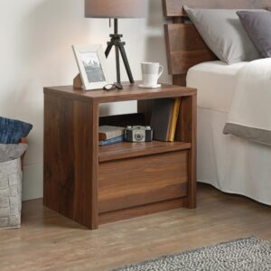 this night stand from the Harvey Park® collection is the perfect complement to any bedroom. It features an easy gliding drawer that is perfect for storing crossword puzzles