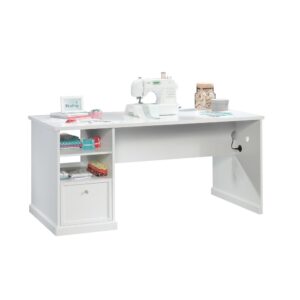 Time to get crafty! Let your creativity run wild while you work on this handy craft table from the Craft Pro Series®. This storage craft table features a spacious work surface that is perfect for sewing