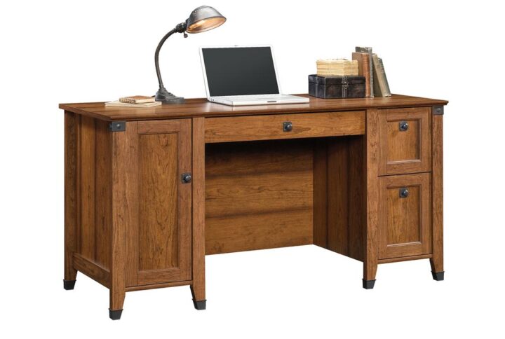 Upgrade your office with this computer desk from the Carson Forge® collection. This home office desks spacious tabletop provides you with room for all your office essentials – sticky notes