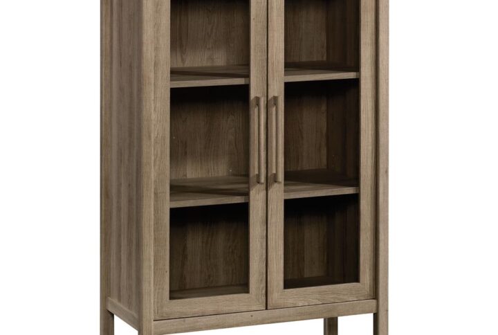 Stylish storage where you need it. Update the look of your home while adding convenient storage space to any room with this storage cabinet from the Anda Norr® collection. Behind it large double doors with framed