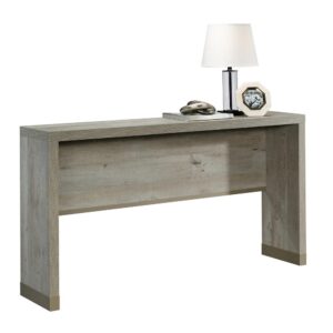 A touch of modern farmhouse beauty is just what your living room is missing. Add beautiful style and design to your home with this sofa table from the Manhattan Gate® collection. This behind sofa table features a spacious top surface that provides you with the perfect amount of space to store and display a variety of different items like an accent lamp