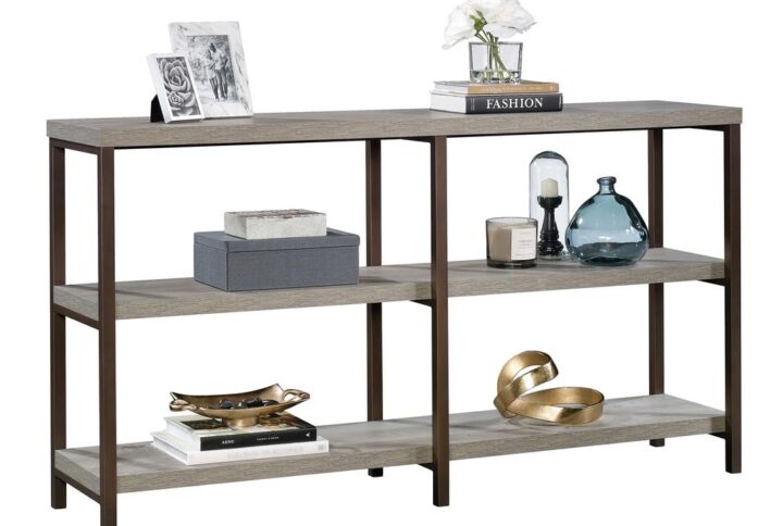 You can never have too much storage space in your home – right? Add versatile storage options to any room while creating a beautiful focal point that is sure to stand out with this console table from the Manhattan Gate® collection. This stunning table features two large open shelves that are ideal for storing an array of different items like your collection of books