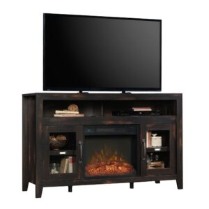 Create a warm and inviting space in your home with this entertainment credenza from the Dakota Pass® collection. It accommodates up to a 60" TV