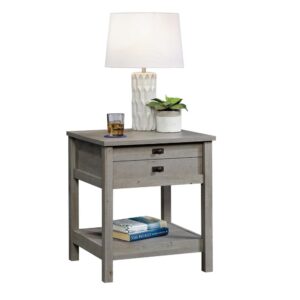 No bedroom is complete without a stylish night stand. Add a touch of charming design and beauty to your favorite room to snooze in with this night stand from the Cottage Road® collection. Its spacious top surface provides you with the ideal amount of space for all your bedside necessities like your alarm clock