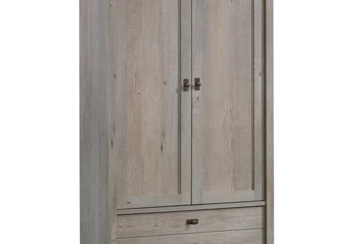 The storage fix that you've been craving. Create the versatile storage options that your home needs while adding the beautiful style and charming design that you want with this armoire from the Cottage Road® collection. Behind its large