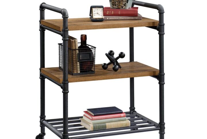 Industrial-inspired style that can roll with you. Add unique design and beauty to any room in your home with this multi-purpose cart from the Iron City® collection. This industrial rolling cart features three spacious open shelves that are ideal for storing and displaying an array of different items like your favorite novels