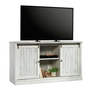 News flash – sliding barn doors are a must-have! Give your home the style it deserves with the trendy design and charming good looks of this credenza from the Barrister Lane® collection. This entertainment stand accommodates up to a 60" TV