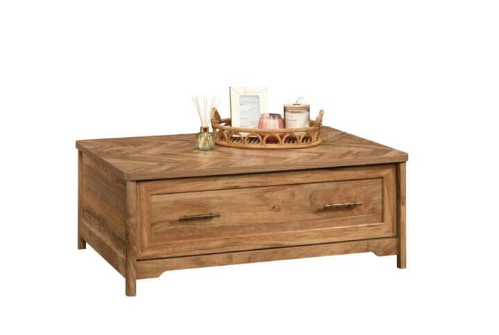 No living room is complete without the perfect centerpiece. Draw the attention to the center of your home with the unique style and coastal-inspired vibe of this coffee table from the Coral Cape® collection. This living room coffee table features a durable