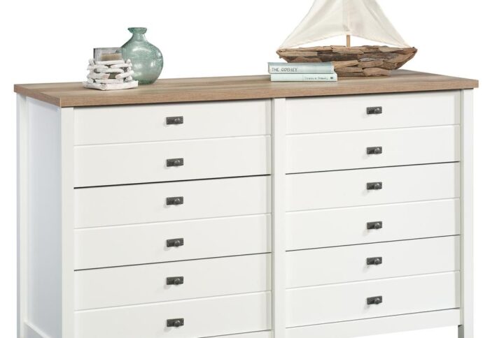 Style and storage – the perfect match! Give your bedroom the versatile storage options it has always needed while adding the charming style and beauty that you crave with this dresser from the Cottage Road® collection. It features six spacious drawers that open and close on smooth metal runners for easy access storage of a variety of different items