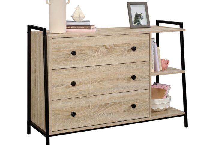 Don't let a lack of storage space get you down. Create the storage space that your bedroom needs without having to sacrifice on style with this dresser from the North Avenue® collection. This 3 drawer chest features three spacious drawers that open and close on smooth metal runners. These large drawers are ideal for stowing away items like stacks of slacks and your favorite blouses to comfy sweatshirts and your collection of pajama pants. This 3 drawer dresser also includes two opens shelves that provide additional storage space or a place to display home décor like decorative plants. The large top surface provides even more bedroom furniture options to store and display items like an accent lamp