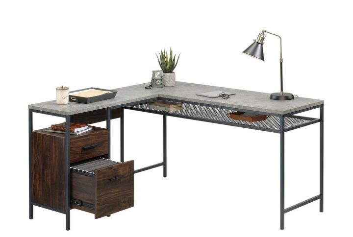 Find the motivation you need to tackle your big projects with the charming good looks and functional design of this L-shaped desk from the Market Commons® collection. This home office desk offers a spacious top surface that provides room for office essentials like your laptop