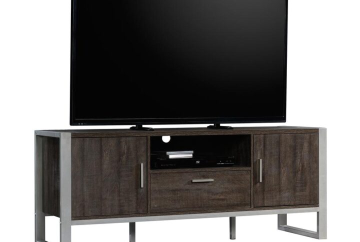 Time for an entertainment upgrade? Give your home a fresh new look with the contemporary style and modern design of this TV credenza form the Rock Glen collection. This TV stand with doors accommodates up to a 65" TV so you can invite all your family and friends over for the next big game. The cubby storage area can be used to store audio and video equipment or display home décor like knick-knacks and framed photos. The media credenza features a storage drawer that opens and closes on smooth metal runners to conveniently store items like books and board games. Plus