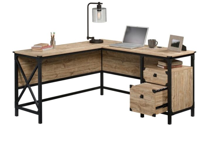 It's time to take care of business! Find the motivation you need to tackle all your big projects with the industrial style and design of this L-shaped desk from the Steel River® collection. This home office desk offers a spacious top surface that provides you with the room you need for all your must-have desk essentials like your laptop