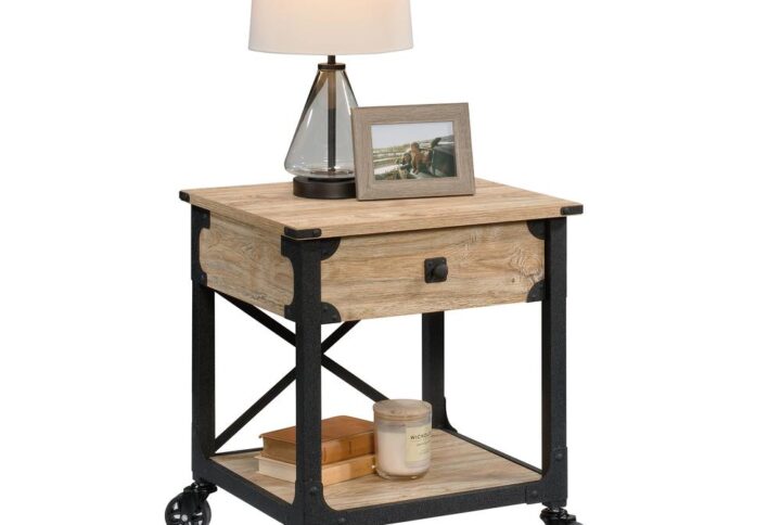 Give your living room a touch of rustic style and design with this metal and wood side table from the Steel River® collection. This industrial side table offers a spacious top surface to set couch side items like accent lamps