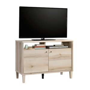 Your big TV deserves a stylish companion. Add a touch of beautiful style and functional design to your living room with this TV stand from the Willow Place® collection. This TV stand with doors accommodates up to a 47" TV weighing 50 lbs. or less