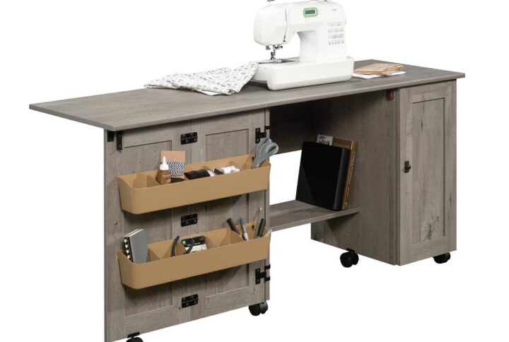 Sewers rejoice! Create a convenient workspace for all your sewing and crafting needs while adding beautiful style to any room in your home with this sewing/craft cart from the Sauder Select collection. This drop leaf craft table offers a spacious top surface that provides you with the room you need for all your supplies like your sewing machine