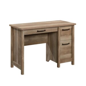 Updating the style of your home office space has never been easier. Add a touch of rustic-inspired design and beauty to your home with this computer desk with drawers from the Cannery Bridge® collection. This home office desk offers a spacious top surface that provides you with the room you need for various items like your laptop