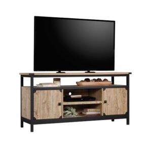 Your TV deserves a stylish counterpart. Give your living room the update it deserves with the stylish industrial-inspired TV credenza from the Steel River® collection. This metal and wood credenza accommodates up to a 60" TV