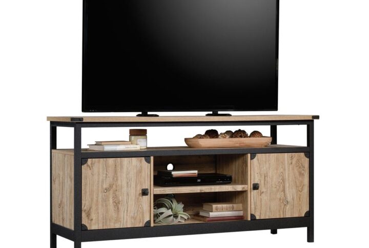 Your TV deserves a stylish counterpart. Give your living room the update it deserves with the stylish industrial-inspired TV credenza from the Steel River® collection. This metal and wood credenza accommodates up to a 60" TV