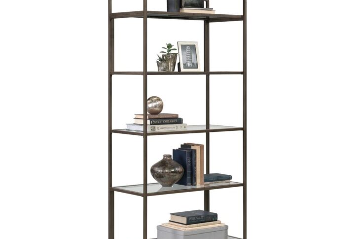 Create a beautiful focal point in your home with the elegant style and modern design of this metal and glass bookcase from the International Lux® collection. This 5-shelf bookcase includes five open storage for neat organization and display. Each shelf features safety-tempered glass for an extra touch of luxury. Its spacious shelves are ideal for showcasing home décor like decorative plants