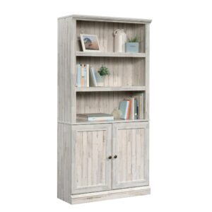 Add the storage solutions your home needs without sacrificing the style you love with this 3-shelf bookcase from the Sauder Select collection. This bookcase with doors features three large shelves that provide space to store and display items like your favorite novels